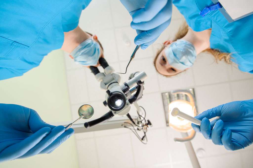 Root tip microsurgery (apicectomy)